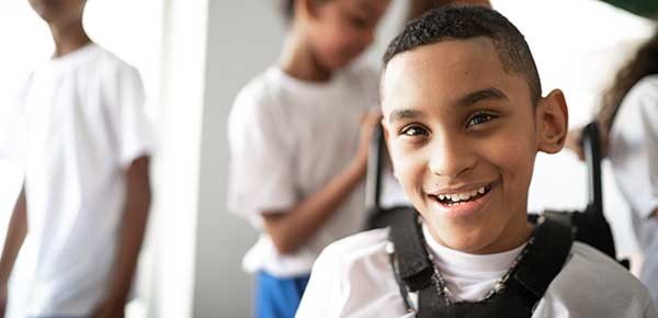 Smiling boy in hallway