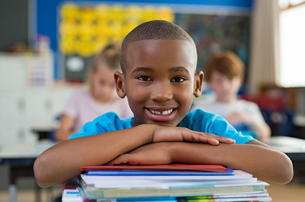 Boy smiling in class